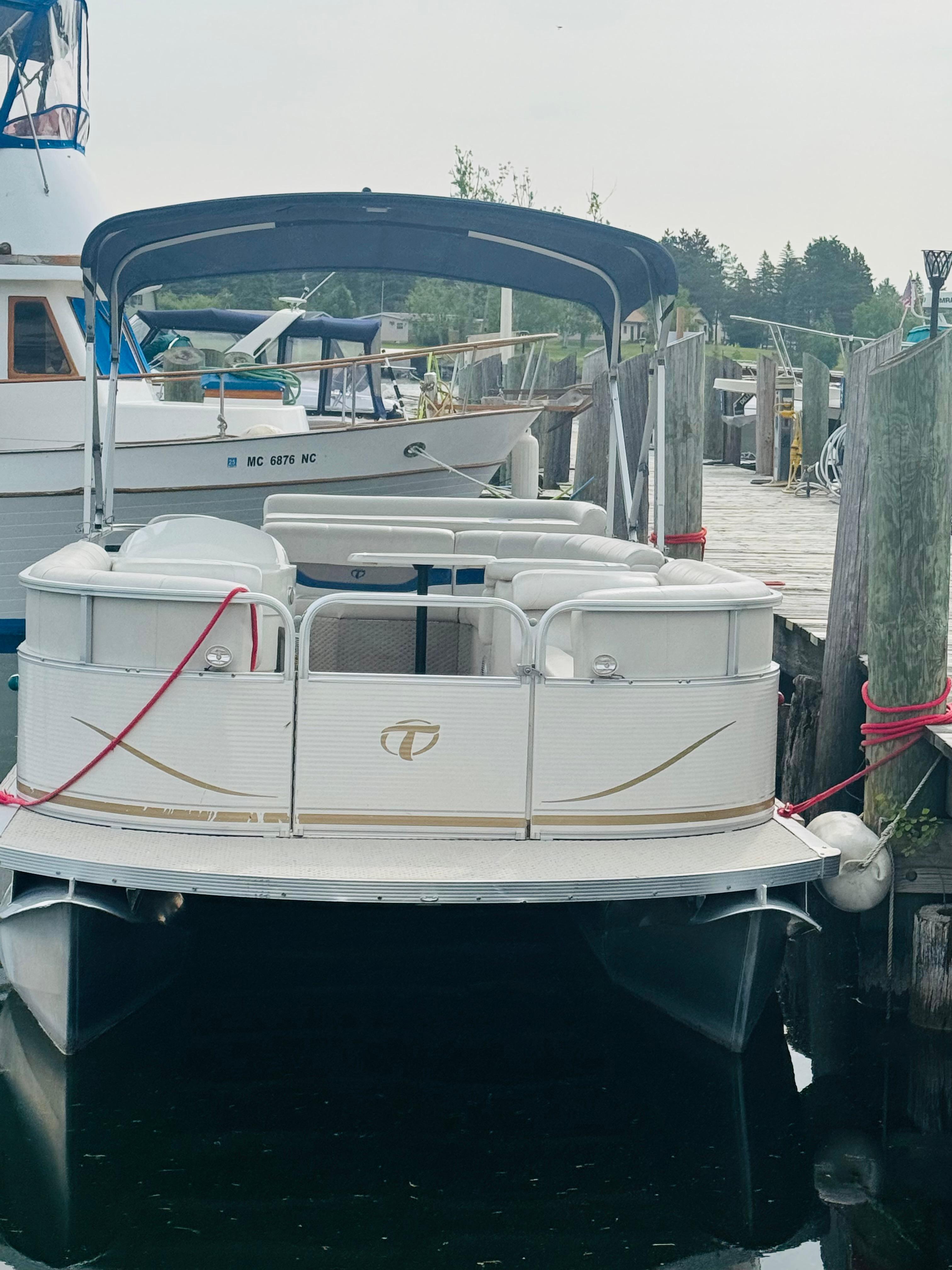 Pontoon boat on Cheboygan River